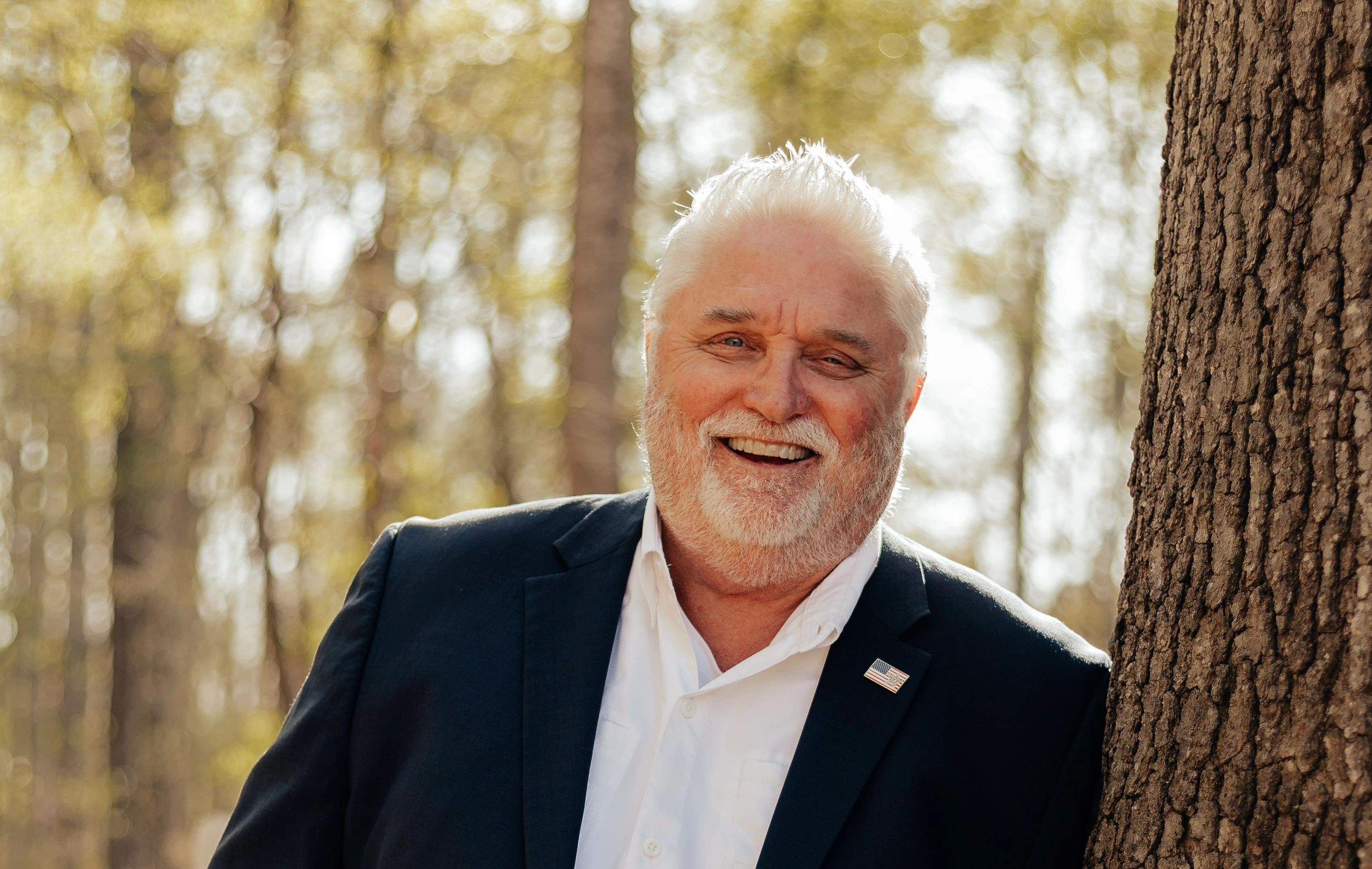 Mike Campbell laughing outdoors